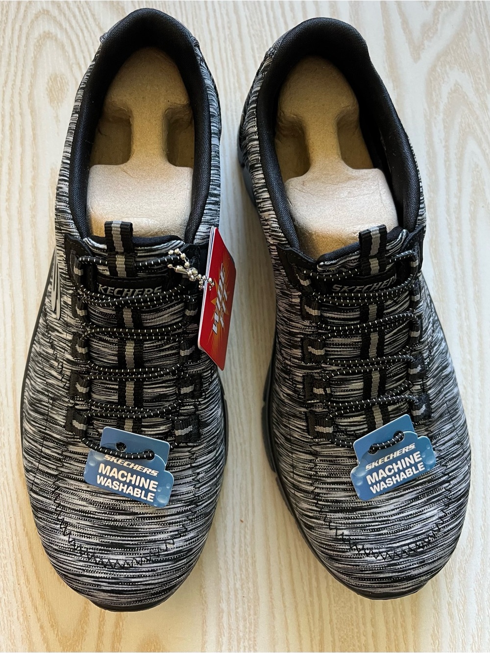 Skechers Empire Game On slip-on fashion sneaker upper a knit mesh&bungee laces